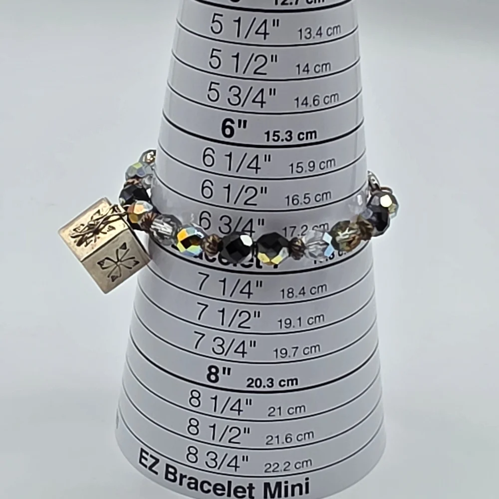 Elegant Black and Gold Charm Bracelet